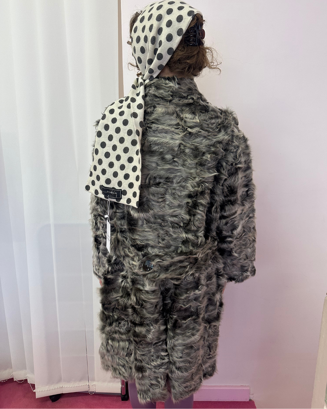 Grey fur with iridescent buttons