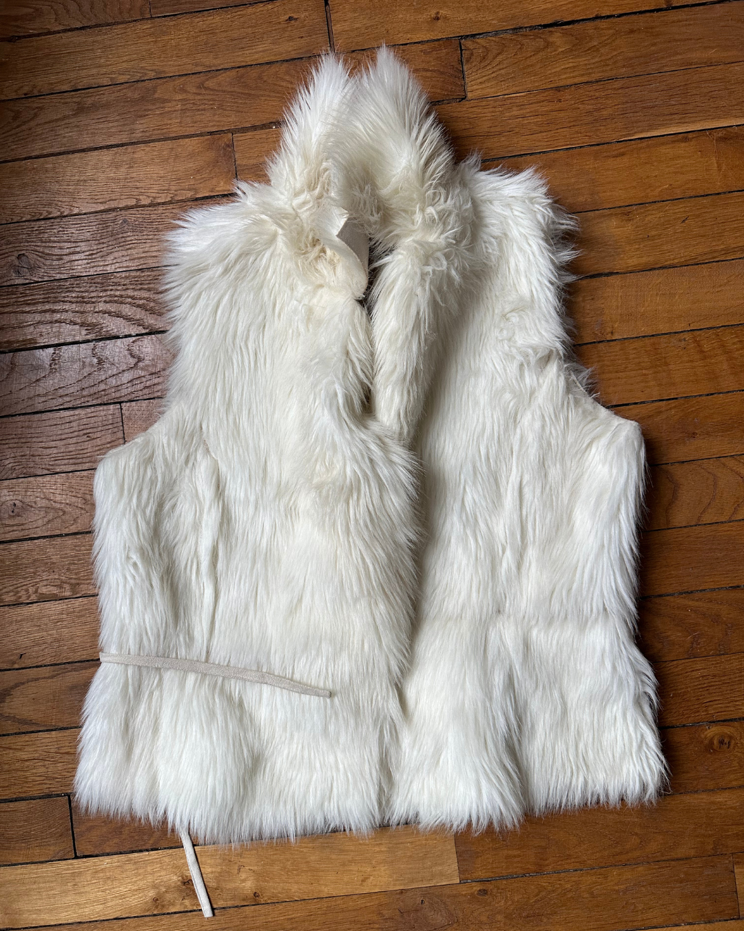 Cream sleeveless fur