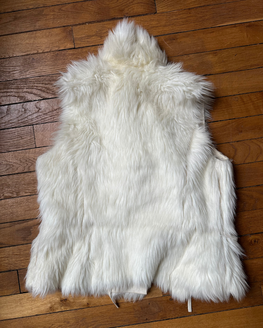 Cream sleeveless fur