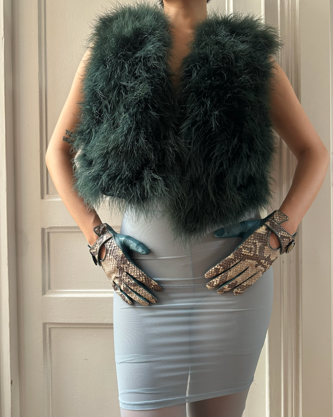 Green feather sleeveless jacket