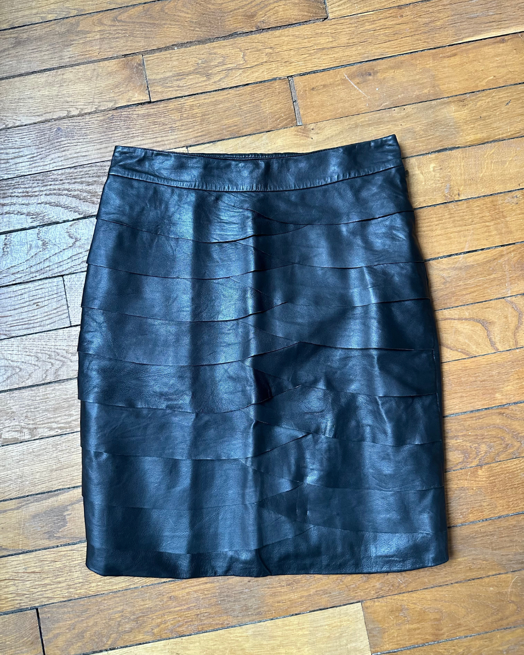 Black leather skirt with ruffles