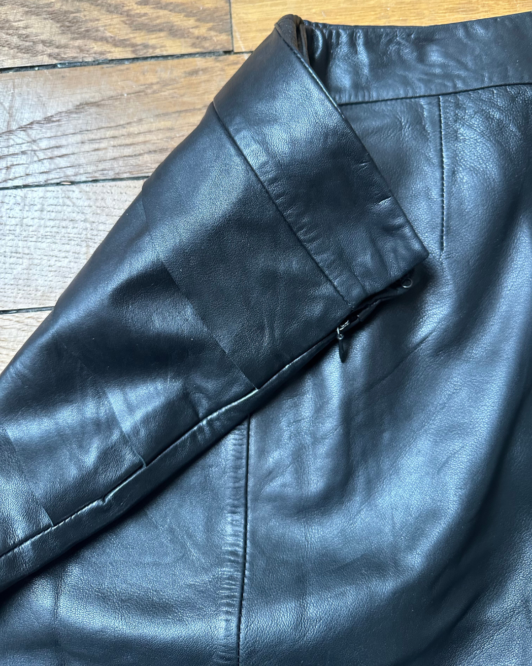 Black leather skirt with ruffles