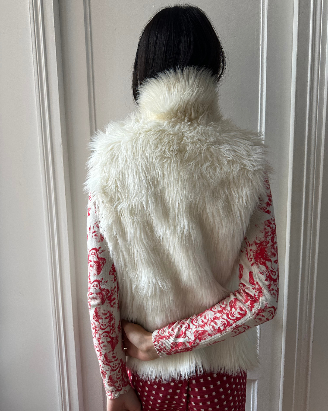 Cream sleeveless fur