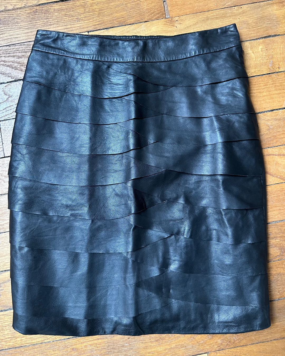 Black leather skirt with ruffles