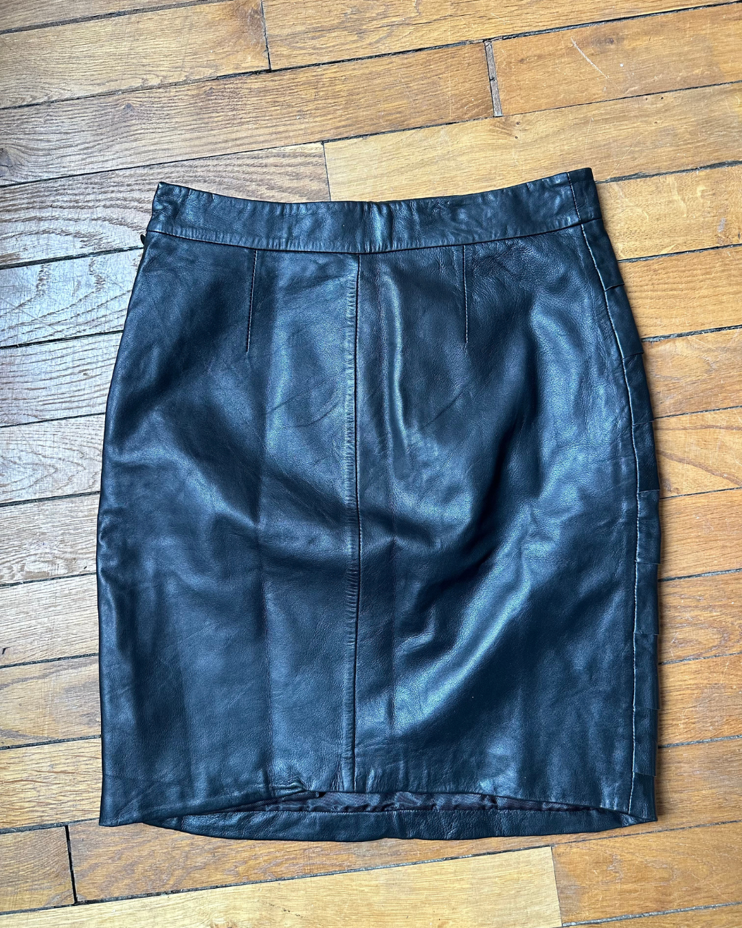 Black leather skirt with ruffles