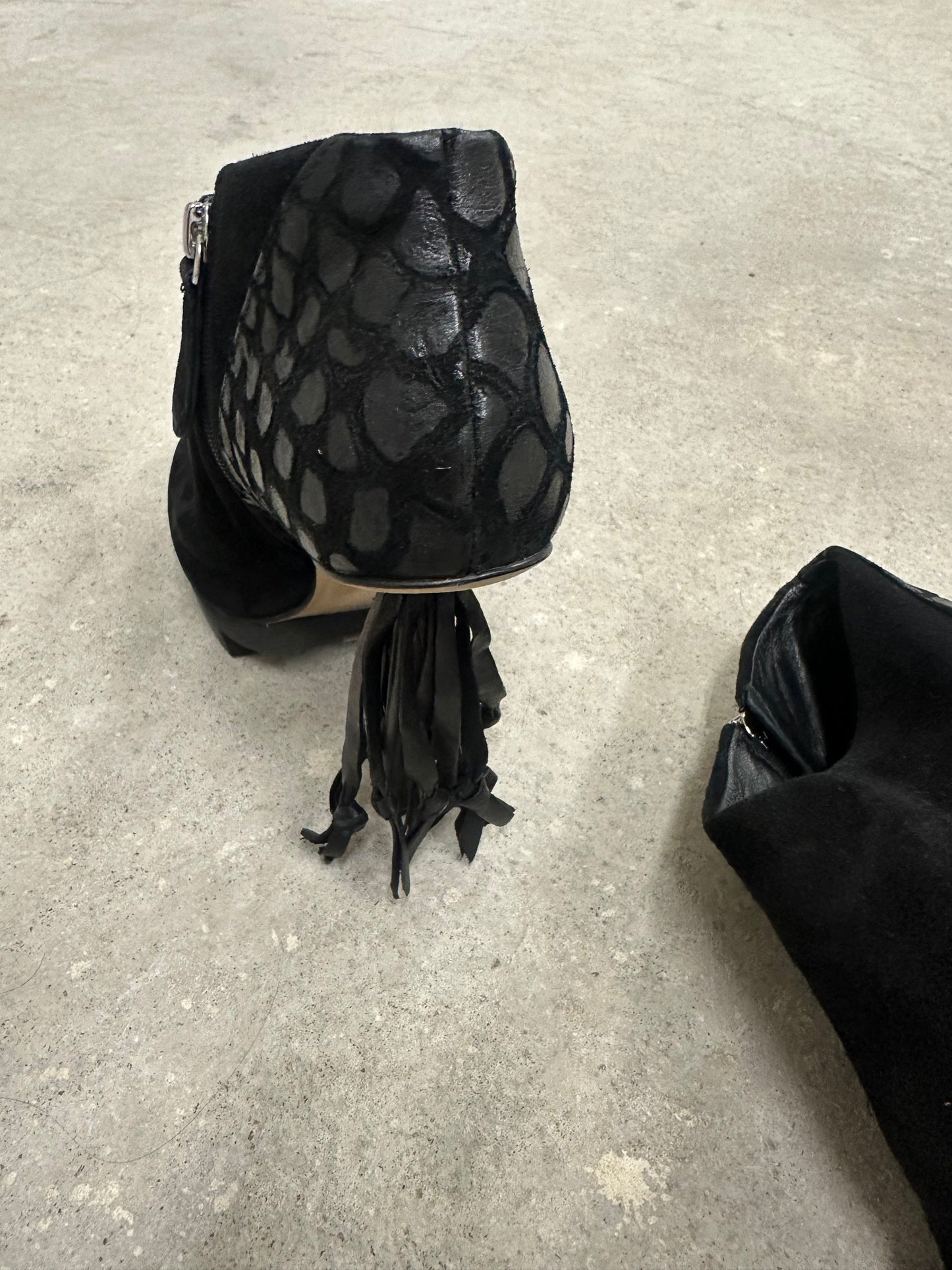 Black heels with fringes