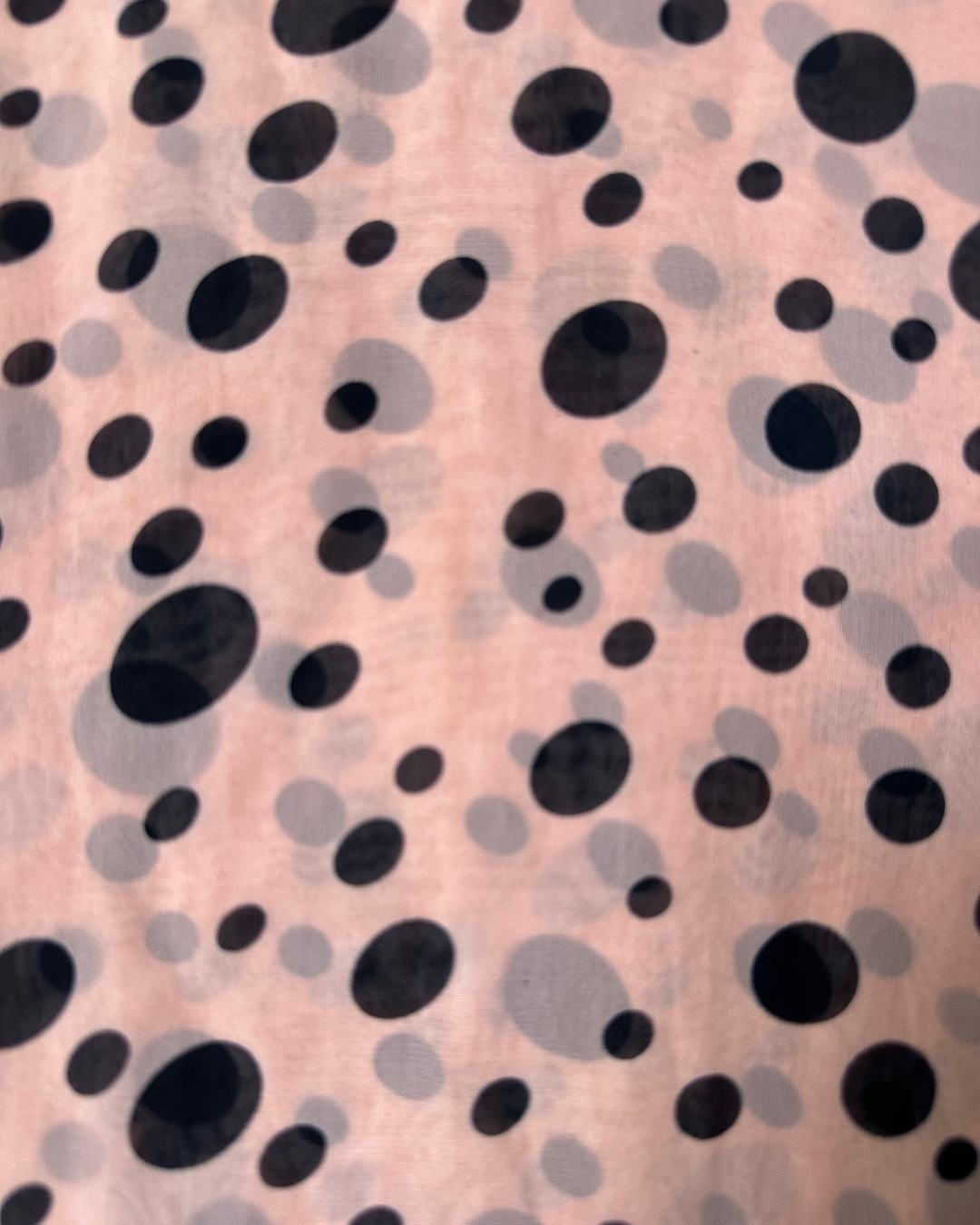 Pink scarf with black polka dots
