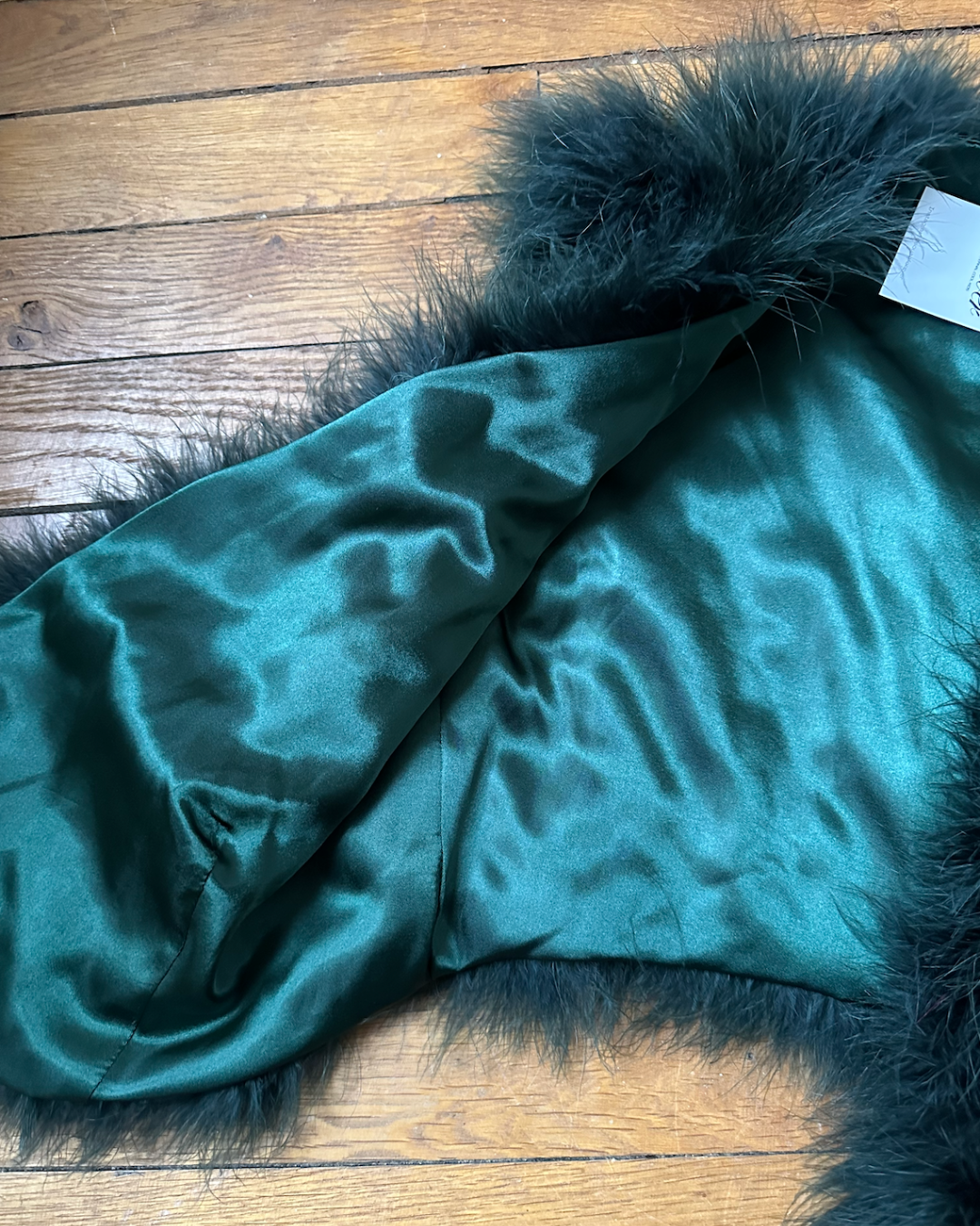 Green feather sleeveless jacket