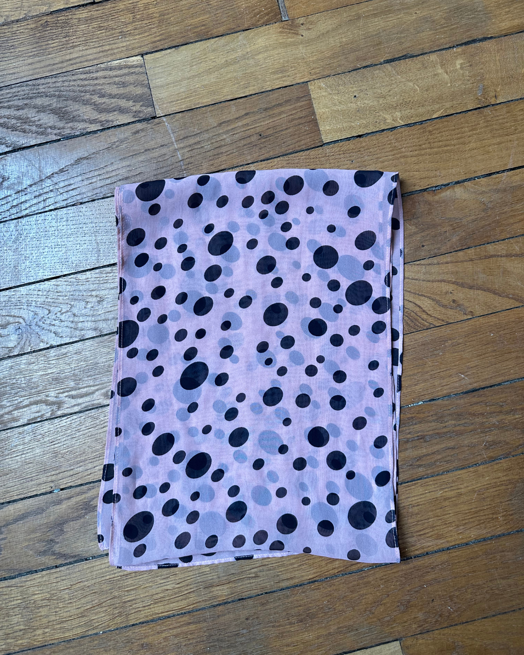 Pink scarf with black polka dots