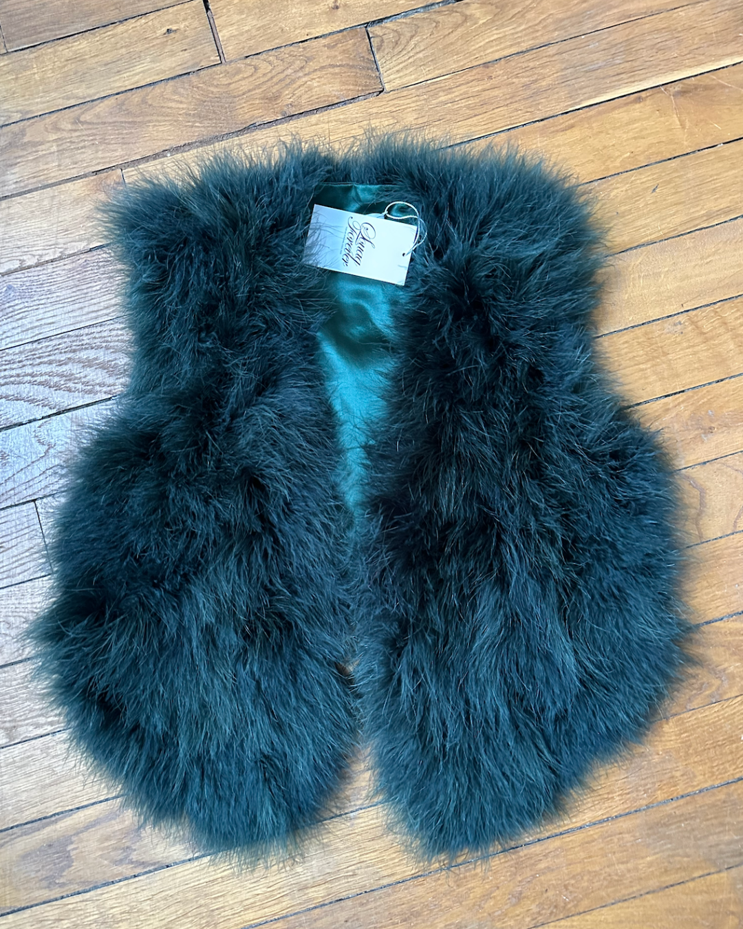 Green feather sleeveless jacket