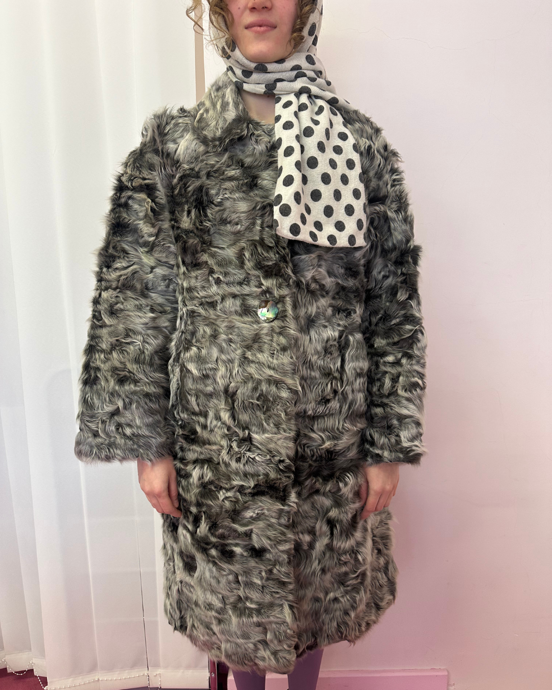 Grey fur with iridescent buttons