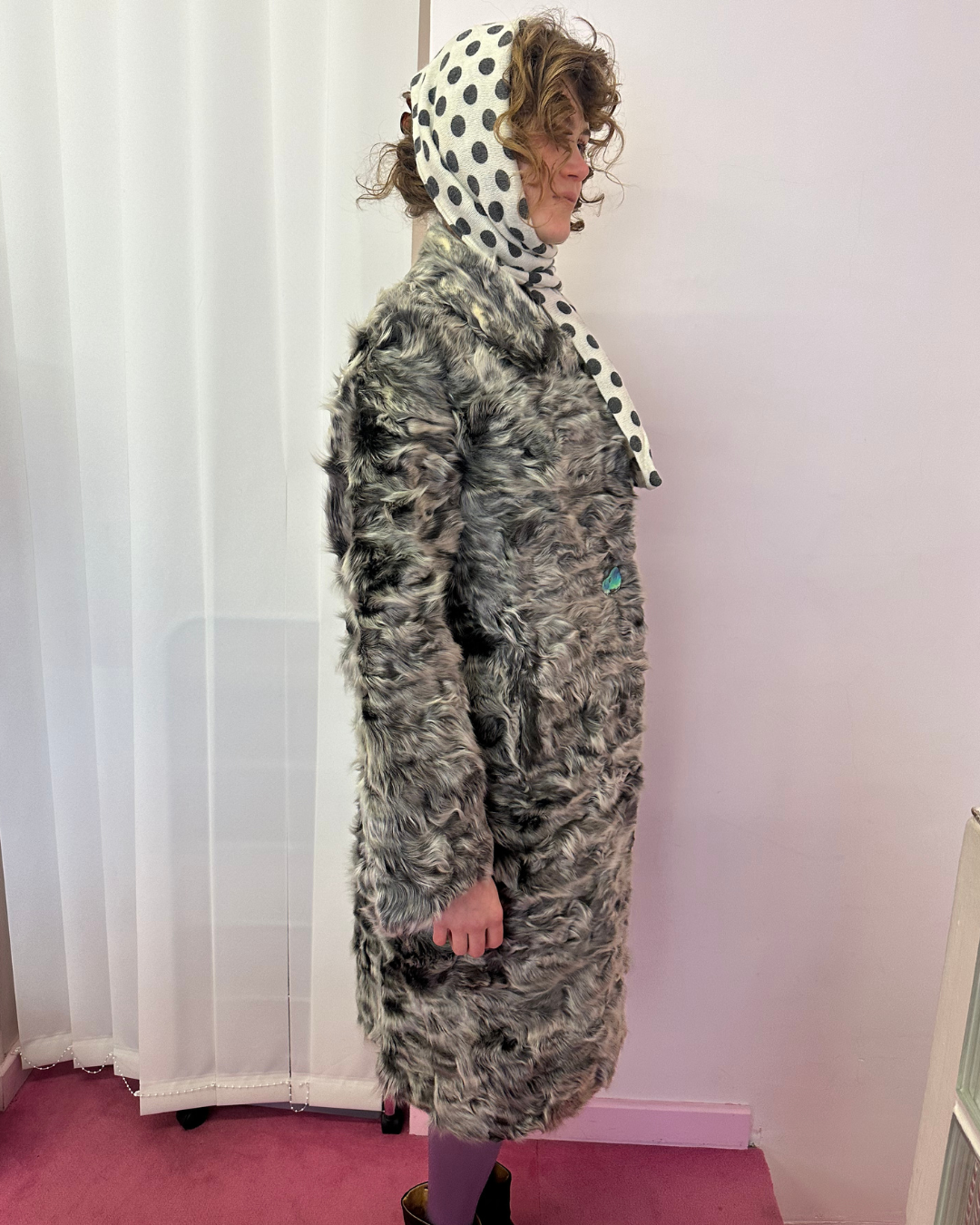 Grey fur with iridescent buttons