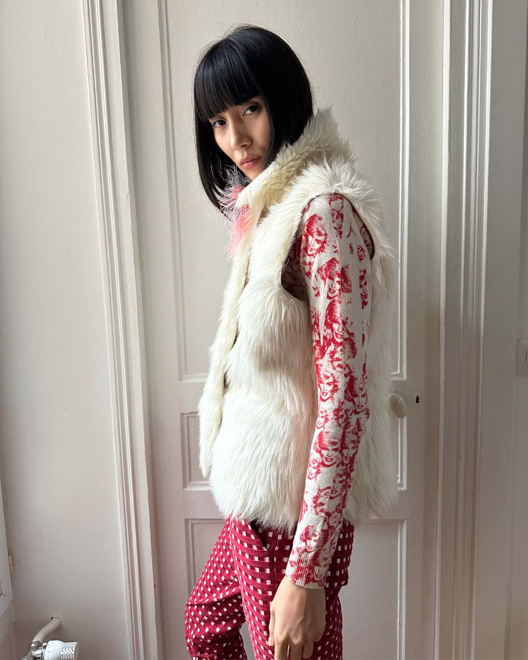 Cream sleeveless fur