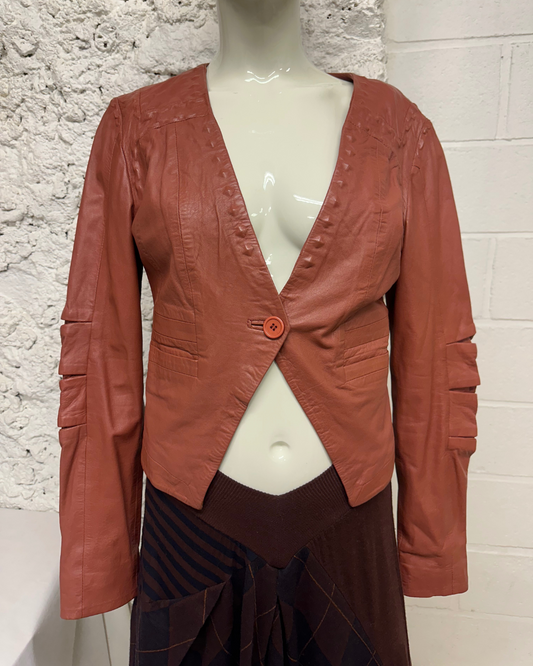 Rust-colored leather jacket