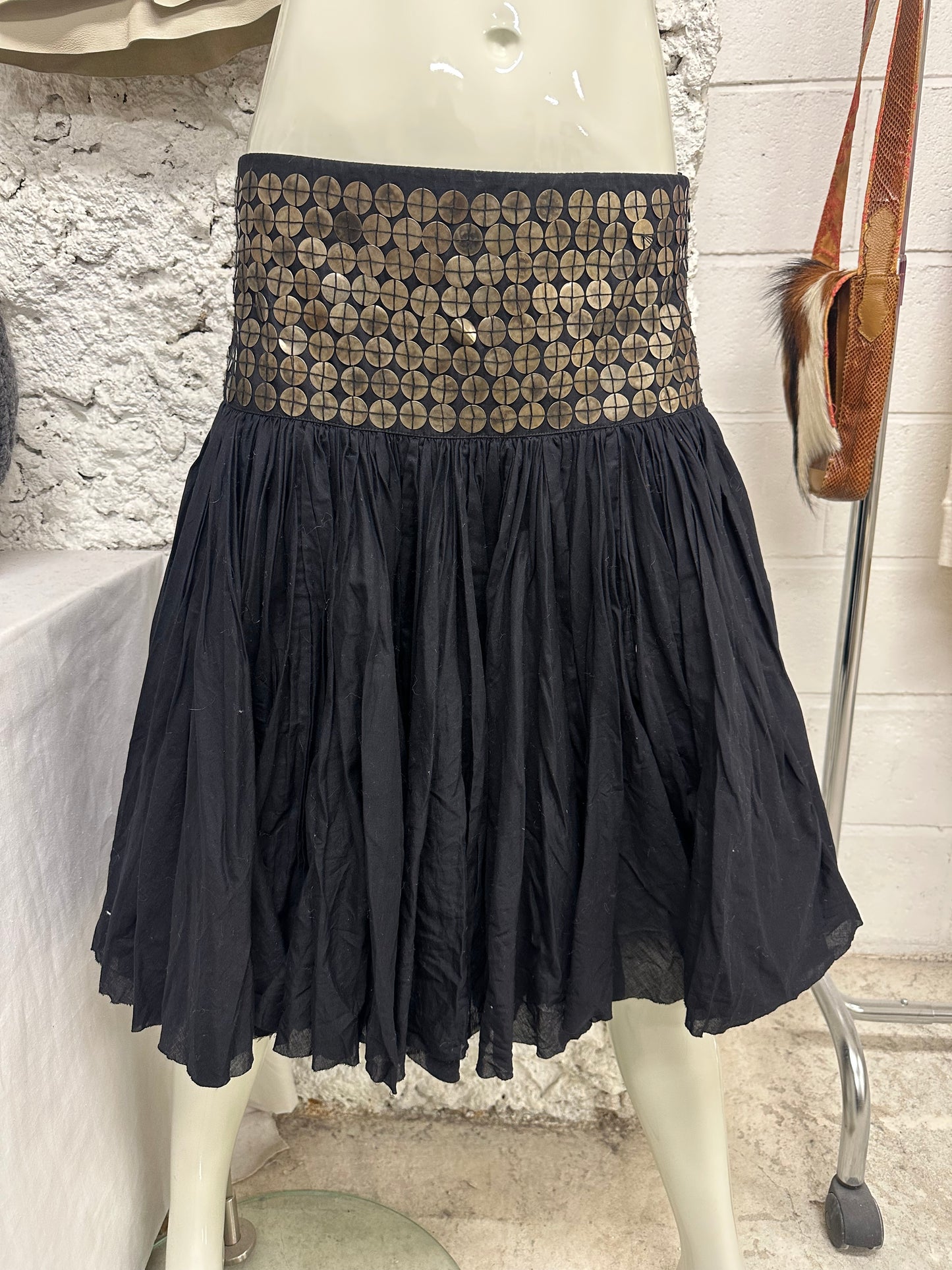 Skirt with metal parts