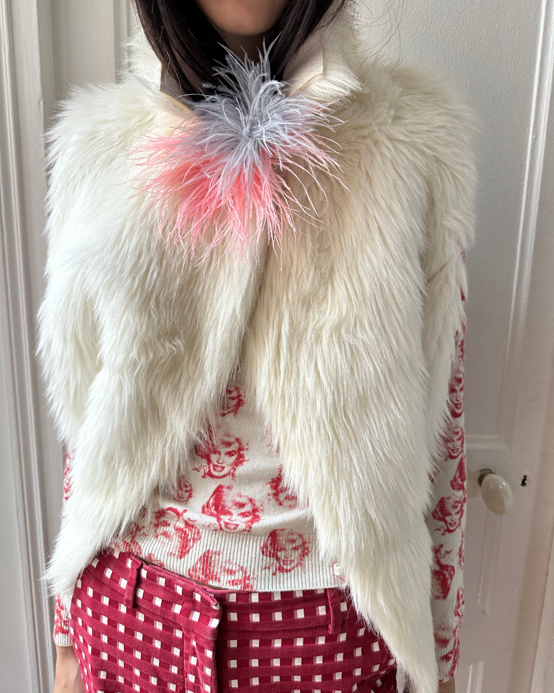 Cream sleeveless fur