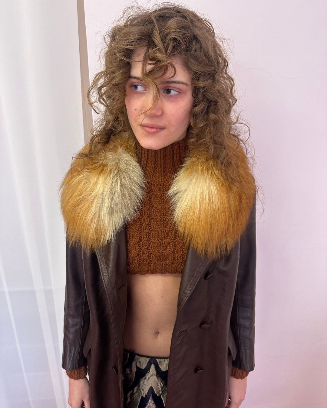 Brown leather jacket with fur collar