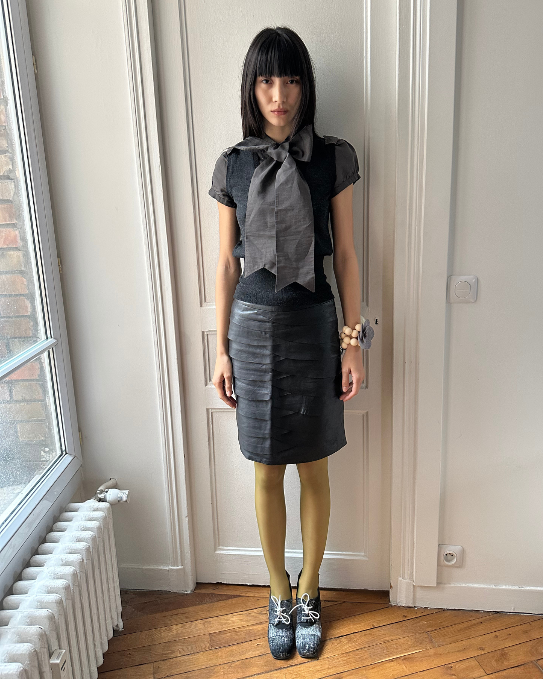 Black leather skirt with ruffles