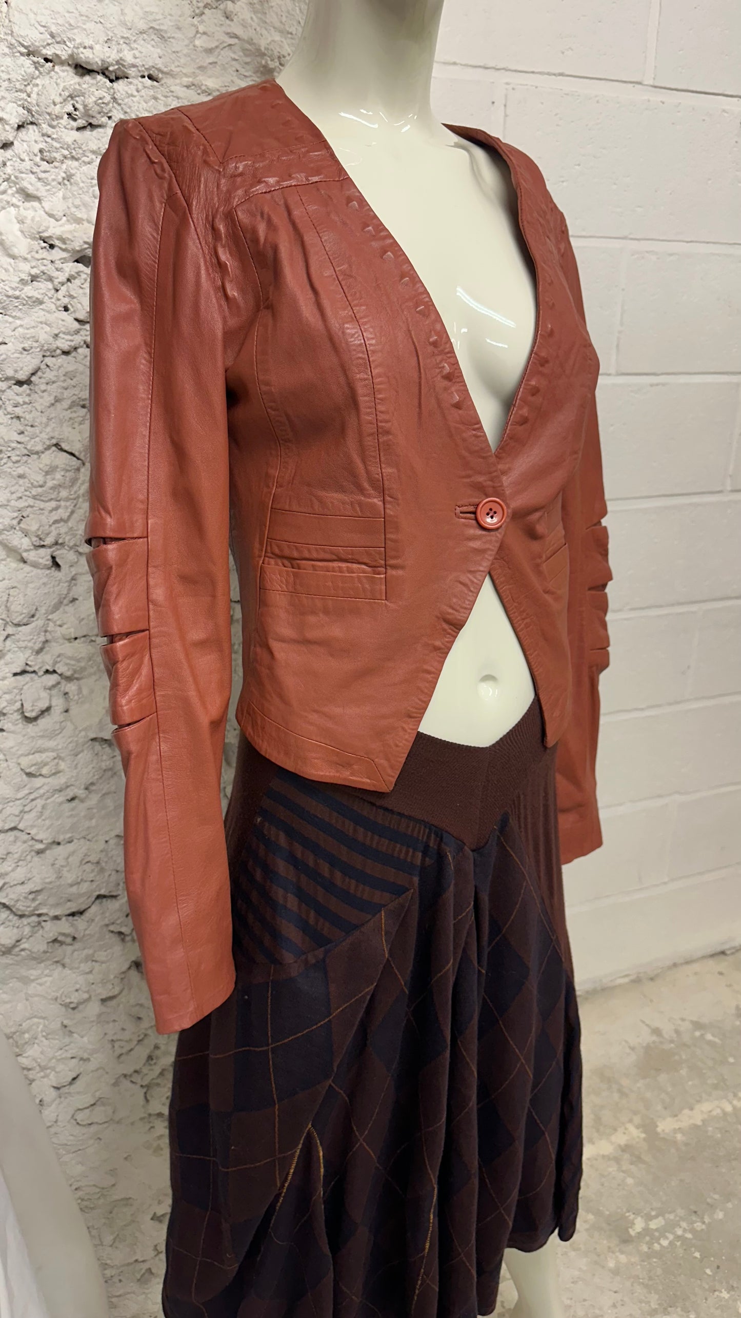 Rust-colored leather jacket