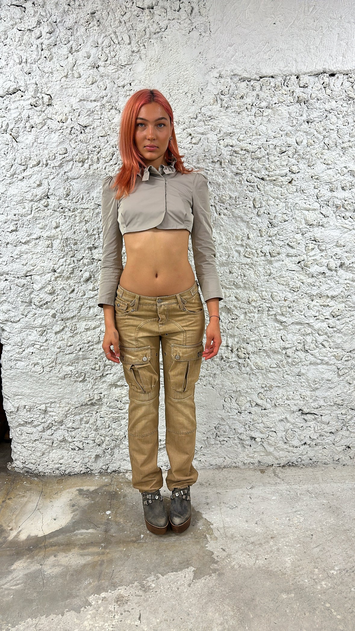 Beige pants with multiple pockets