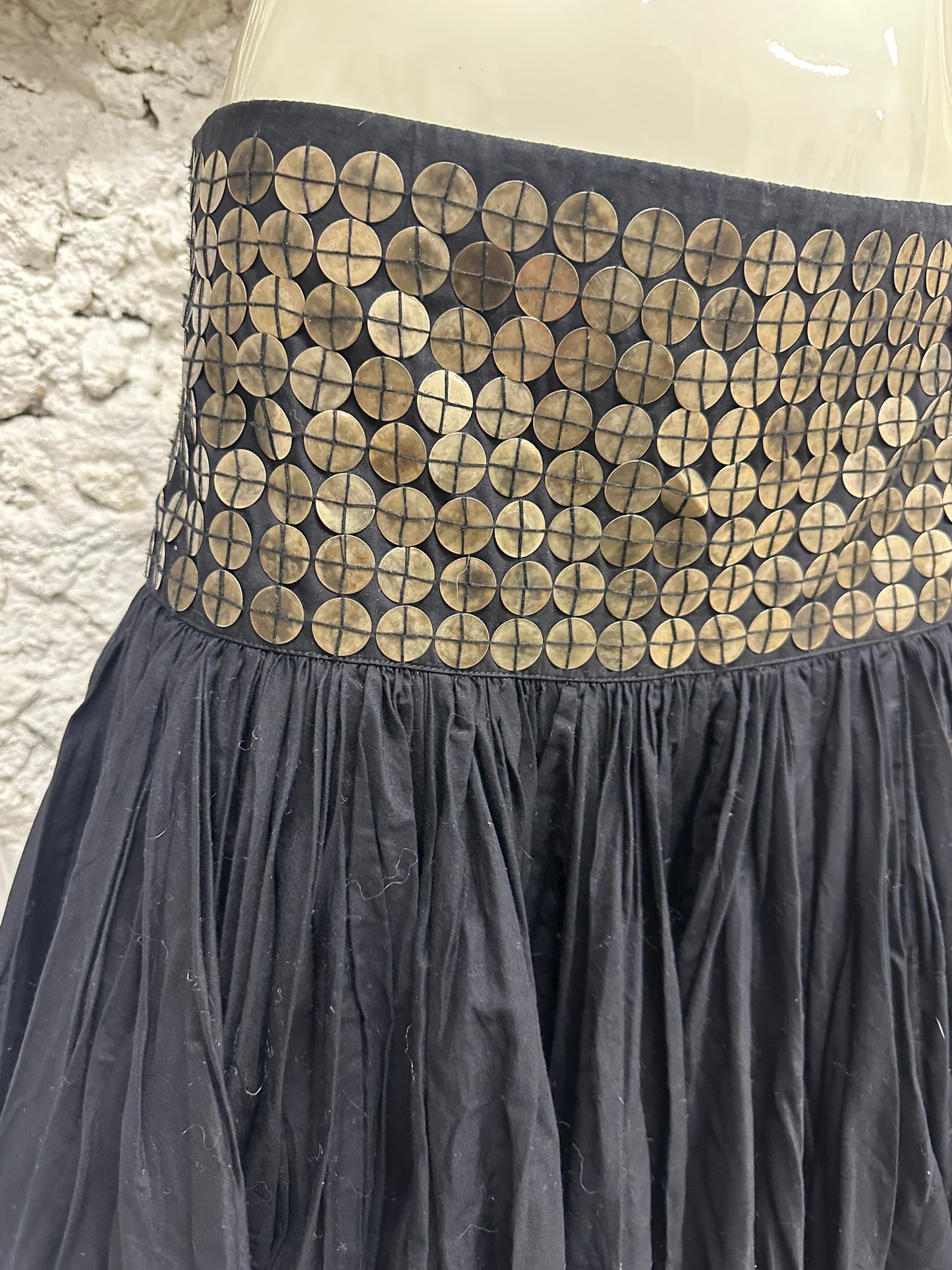 Skirt with metal parts