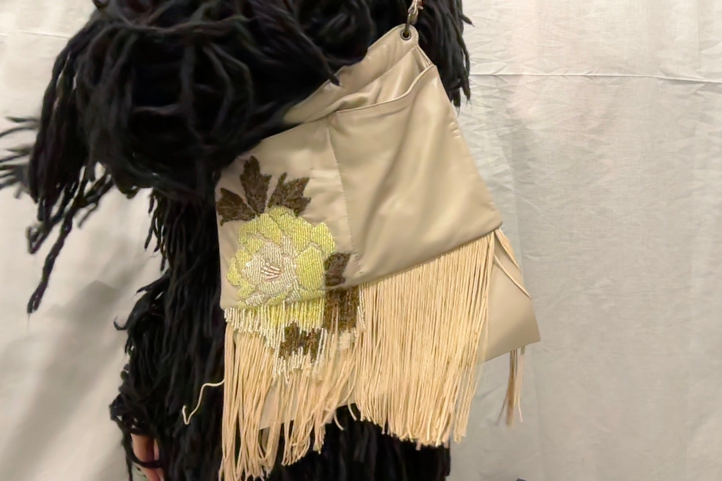 Beaded and fringed handbag