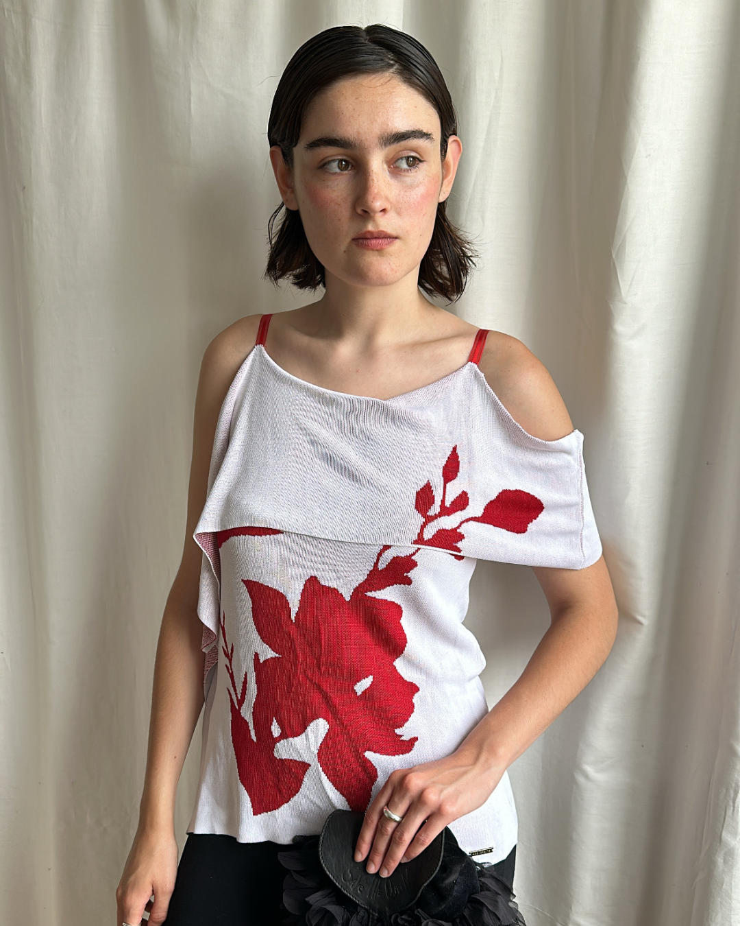 White top with red flowers